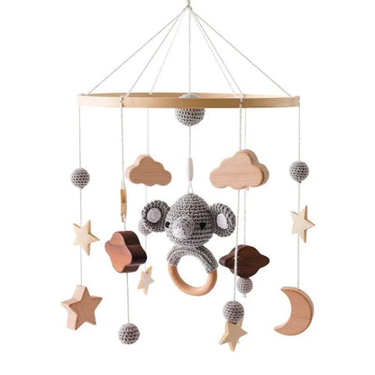 Mobile en bois pour bébé 0 - 12 mois - jouetsbebe.com
