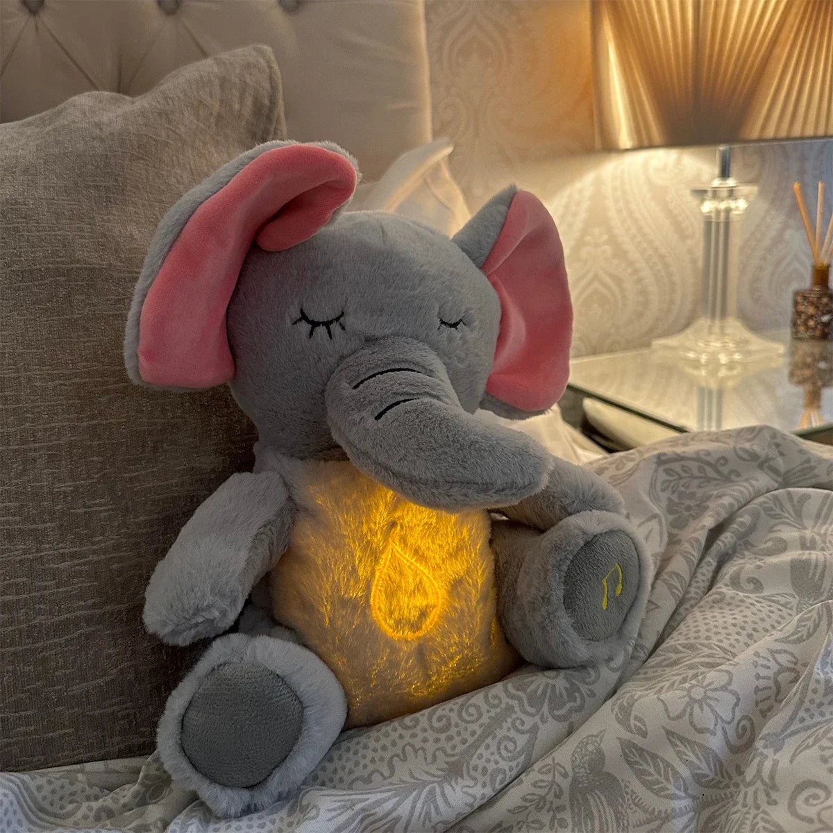 Peluche Éléphant Apaisante – Doudou Respirant Musical & Lumineux 4 Modes - jouetsbebe.com